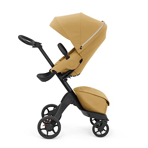 Stokke Xplory X, złoty żółty luksusowy wózek spacerowy regulowany dla wygody dziecka i rodziców wyściółka, szelki odblaskowy zamek błyskawiczny składany w jednym kroku