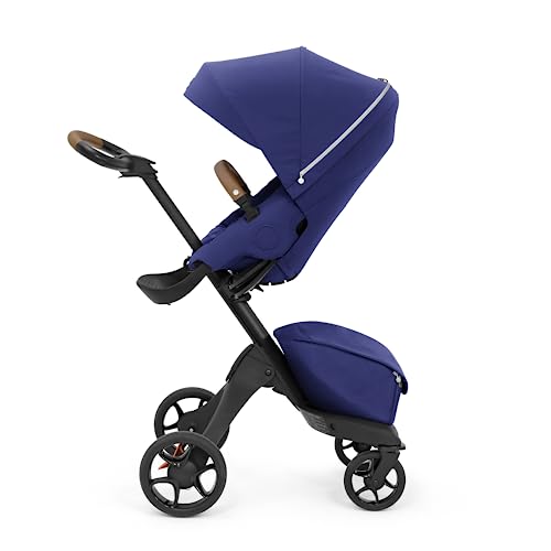Stokke Xplory X, królewski niebieski luksusowy wózek spacerowy regulowany dla wygody dziecka i rodziców wyściółka, szelki odblaskowy zamek błyskawiczny składany w jednym kroku Stokke Xplory X, królewski niebieski luksusowy wózek spacerowy regulowany dla wygody dziecka i rodziców wyściółka, szelki odblaskowy zamek błyskawiczny składany w jednym kroku